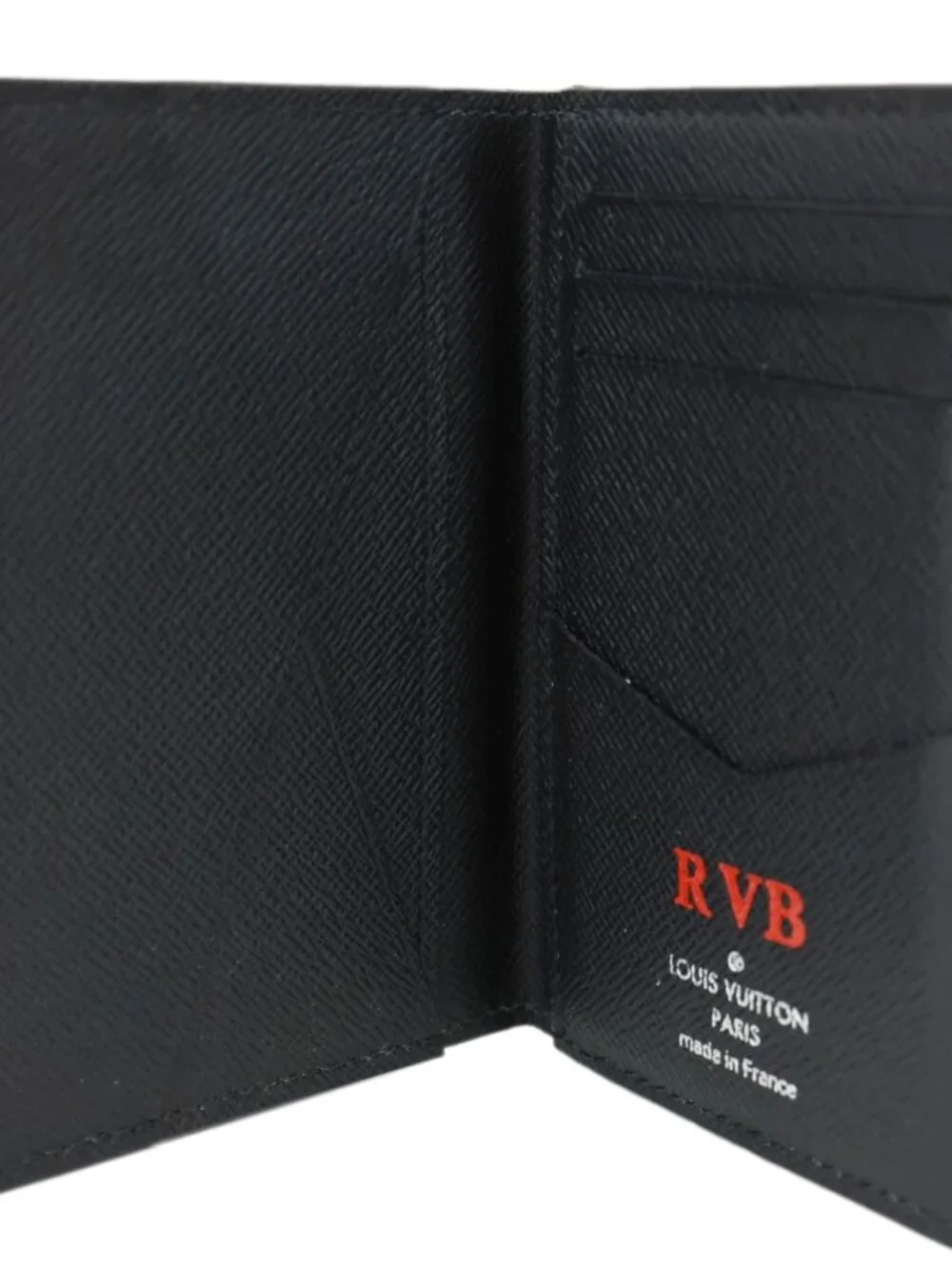 Louis Vuitton  Taiga Leather Bifold Wallet Black